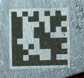 Figure 3- Laser marked Data Matrix on aluminum with the LXQ-100 (a 100 W laser marker). The size of the code is 20mm x 20 mm and the individual cell size is 2 mm. Time to mark is 4.3 seconds.