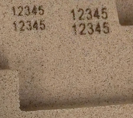 Serial numbers engraved in sand