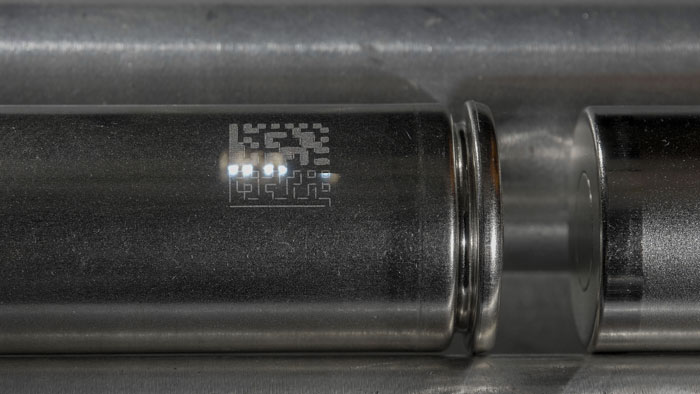 Data matrix code being laser marked on battery casing
