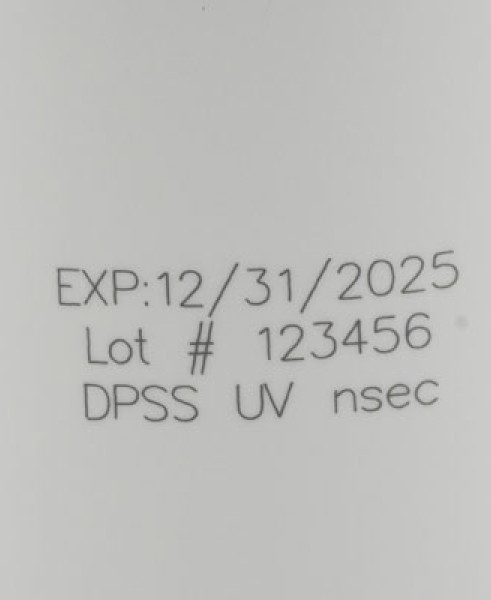 Black laser marking on white plastic