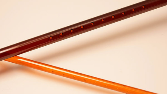 Laser hole drilling of tubes